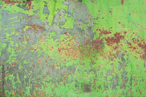 Rusty green sheet of metal. Decrepit coloring. Background.