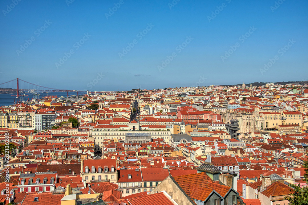 Views of Lisbon where you can see the roofs of their houses and Tagus River.
