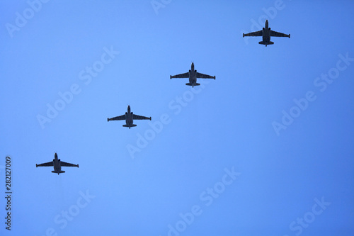 Kyiv, Ukraine - August 24, 2018: Warplanes (armored attack aircraft Su-25) in the sky during the military technique parade in Kiev. Independence day celebration. Military equipment of the armed forces