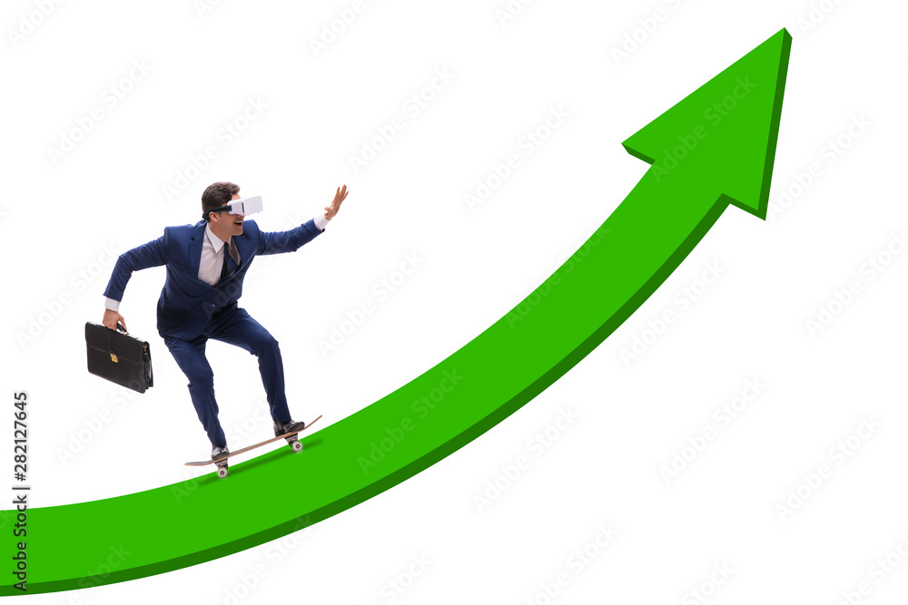 Businessman riding skateboard on financial graph Businessman riding skateboard on financial graph