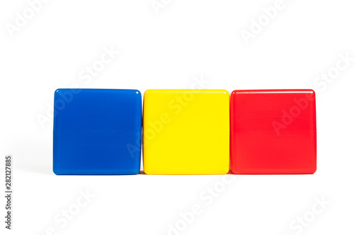 Rumania flag colors  blue  yellow  red in the form of children s cubes. On white background isolated with shadow