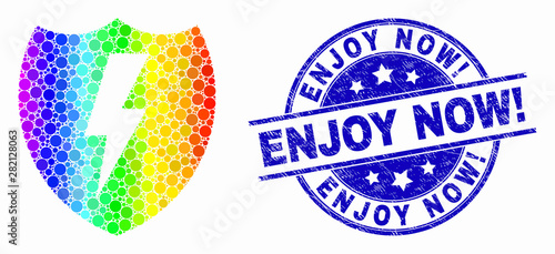 Dotted bright spectral electric shield mosaic icon and Enjoy Now! seal stamp. Blue vector round grunge seal stamp with Enjoy Now! caption. Vector collage in flat style.