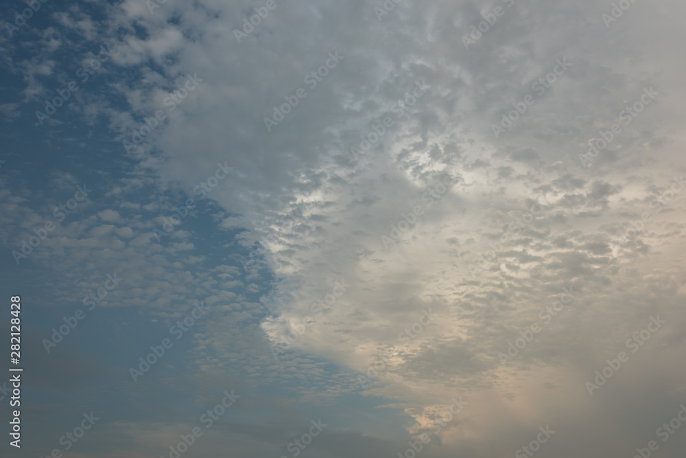 Beautiful colorful clouds and dark clouds in the evening blue sky Beautiful colorful clouds and dark clouds in the evening blue sky