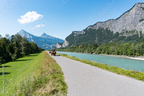 Photography horse and carriage sightseeing tour along the Rhine River in the Swiss Alps