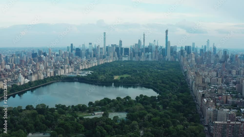 View on Central Park, buildings and skyscrapers from air. Aerial cityscape view of Manhattan from a drone. 