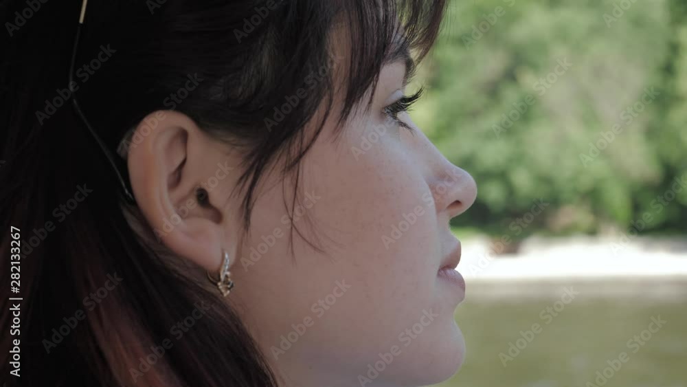 Side View Of Face Of Young Attractive Caucasian Woman With Brown Eyes Side View Of Face Of Young Attractive Caucasian Woman With Brown Eyes