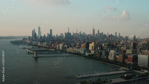 Wallpaper Mural View on a coast and skyscrapers from sky. Cityscape view of Manhattan from a drone. Torontodigital.ca