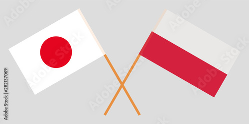 Japan and Poland. Crossed Japanese and Polish flags