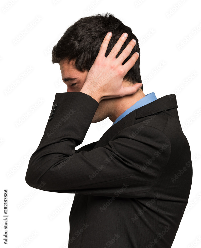 Side portrait of a desperate business man. Isolated on white Side portrait of a desperate business man. Isolated on white