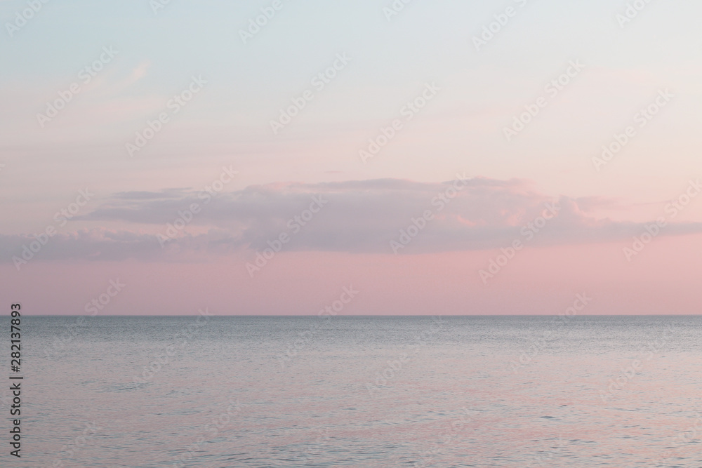 gradient evening sky and calm sea