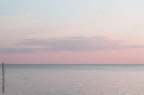 gradient evening sky and calm sea