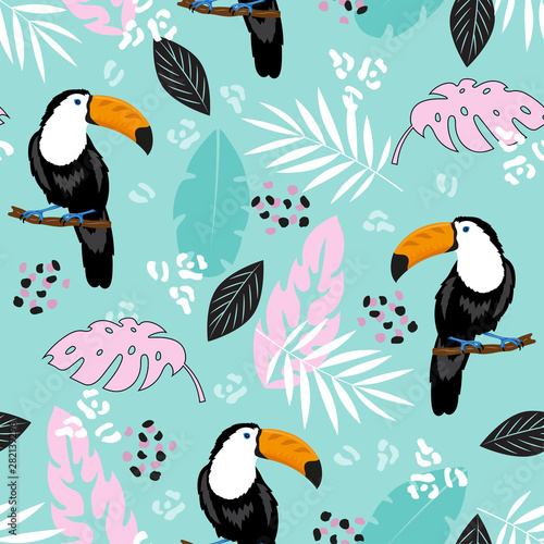 tropical leaves and toucan on blue background seamless pattern