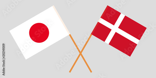 Japan and Denmark. Crossed Japanese and Danish flags