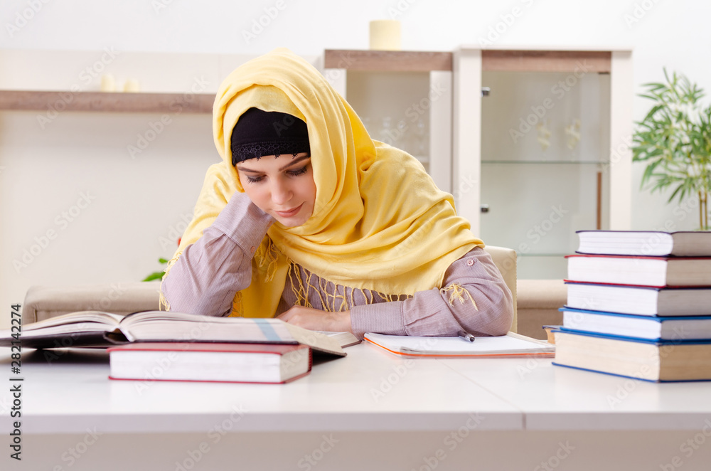 Female student in hijab preparing for exams Female student in hijab preparing for exams