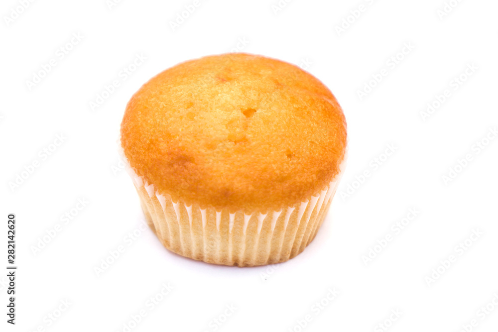 a plain cupcake or madeleine on a white background. a plain cupcake or madeleine on a white background.