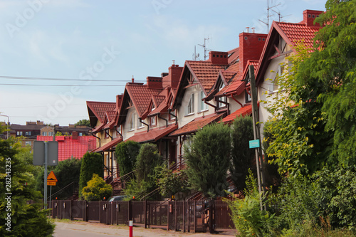 eat stylized blocked houses with a tiled roof.