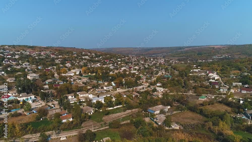 A moldavian village filmed with a drone which si moving farther away. A moldavian village filmed with a drone which si moving farther away.