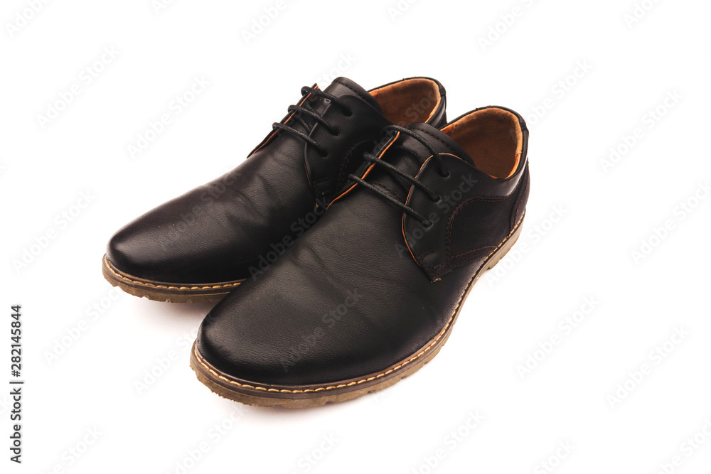 Male leather shoes, side view, isolated on white background Male leather shoes, side view, isolated on white background