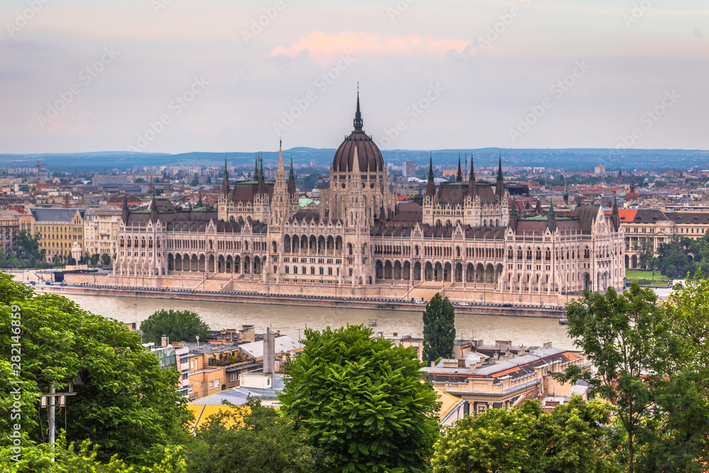 Budapest - June 21, 2019: Parliament building of Budapest by the Danube river, Budapest, Hungary