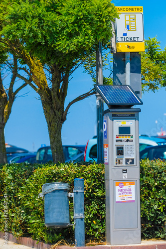 Sotomarina, Italy - July, 2q, 2019: car's parking machine on the parking in Sotomarina, Italt photo