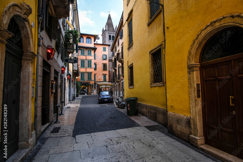 Fototapeta premium Verona, Italy - July, 11, 2019: street in a center of Verona, Italy