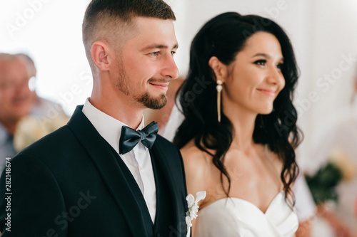 Beautiful wedding couple indoor portrait. © benevolente