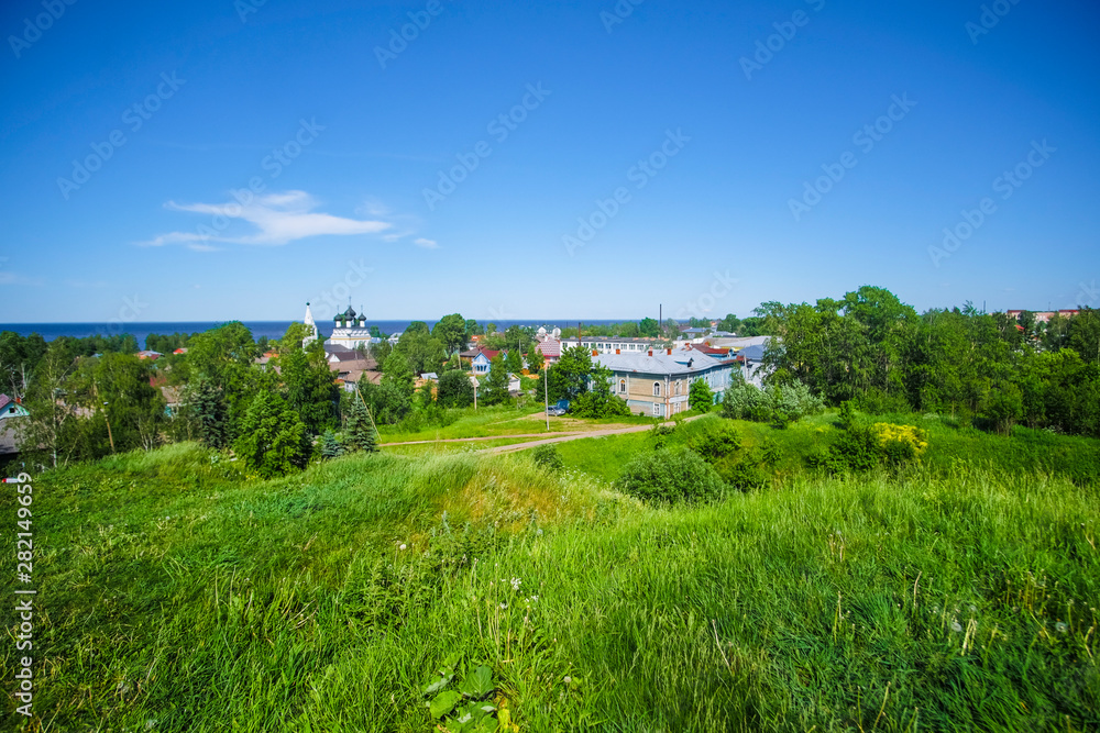 Belozersk, Russia - June, 9, 2019: landscape with the image of old russian north town Belozersk Belozersk, Russia - June, 9, 2019: landscape with the image of old russian north town Belozersk