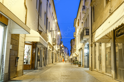 Adria, Italy - July, 11, 2019: one of the central streets of Adria, Italy, in the evening © Dmitry Vereshchagin