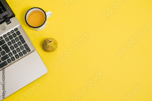 laptop, drink and fruit - simple and healthy lifestyle - work in home