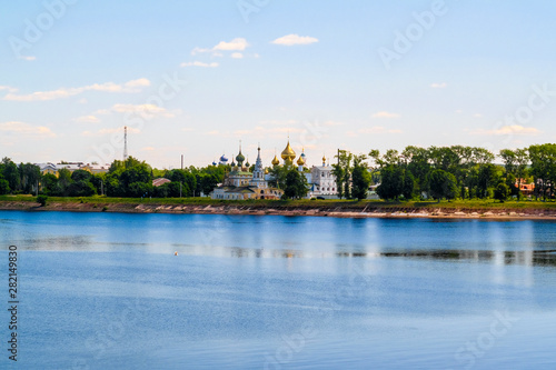 Uglich, Russia - June, 17, 2019: embankment of Volga river in Uglich, Russia with a view to .Kremlin and resurrection monastery