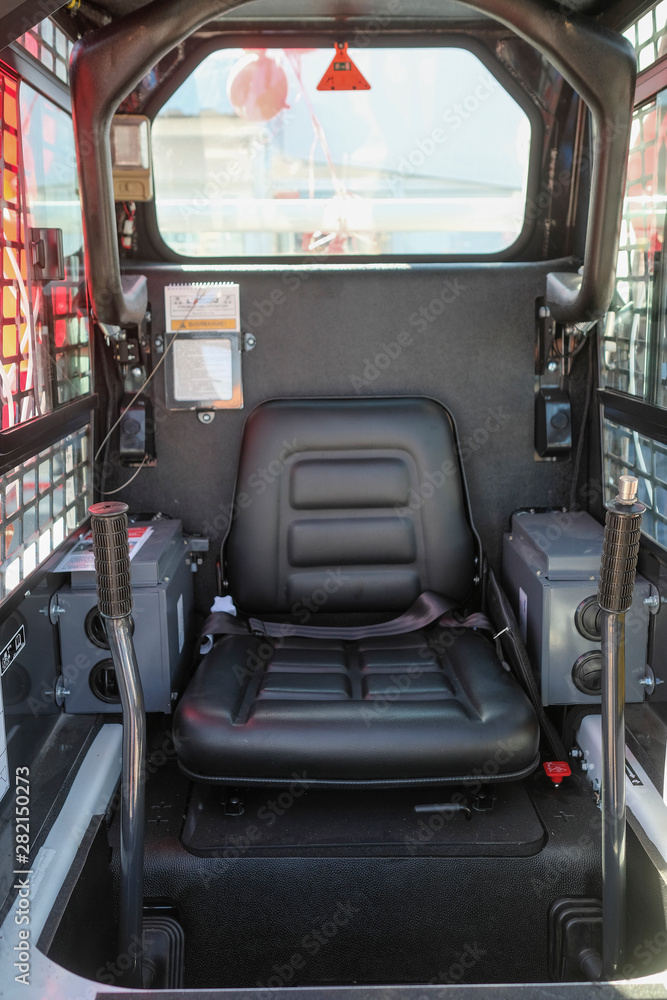 Moscow, Russia - June, 5, 2019: interior of a cabin of a small tractor