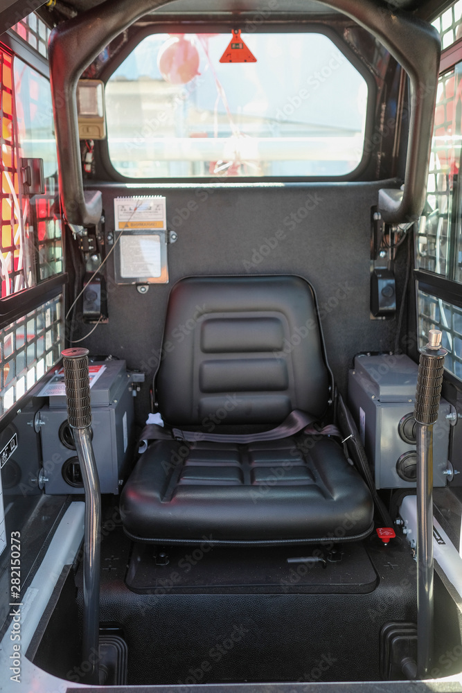 Φωτογραφία Moscow, Russia - June, 5, 2019: interior of a cabin of a small tractor