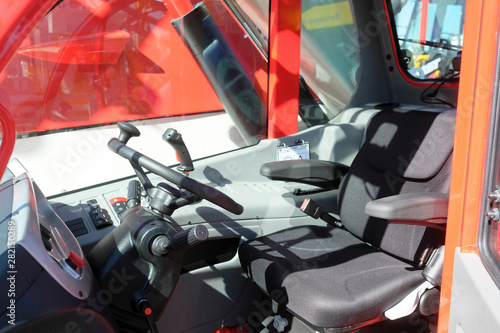 Stampa su tela Moscow, Russia - June, 5, 2019: interior of a cabin of a small tractor