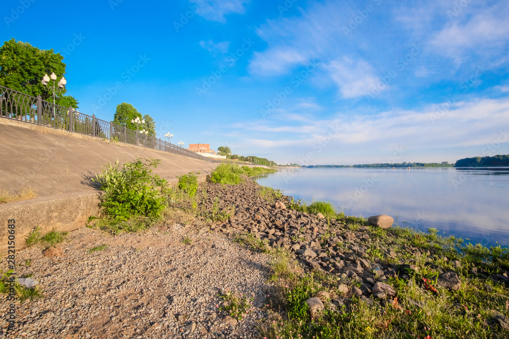 Rybinsk, Russia - June, 10, 2019: landscape with the image of Volga embankment in Rybinsk, Russia at sunrise
