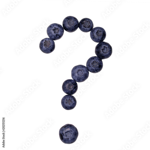 cotout question mark made from blueberries on a white background isolated photo