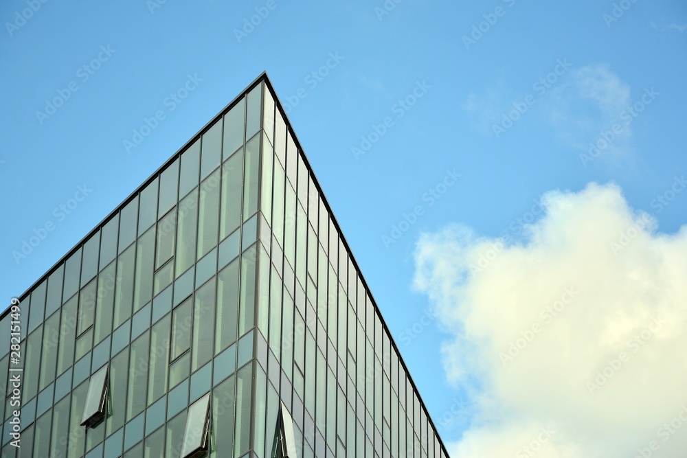 modern building with blue sky and clouds