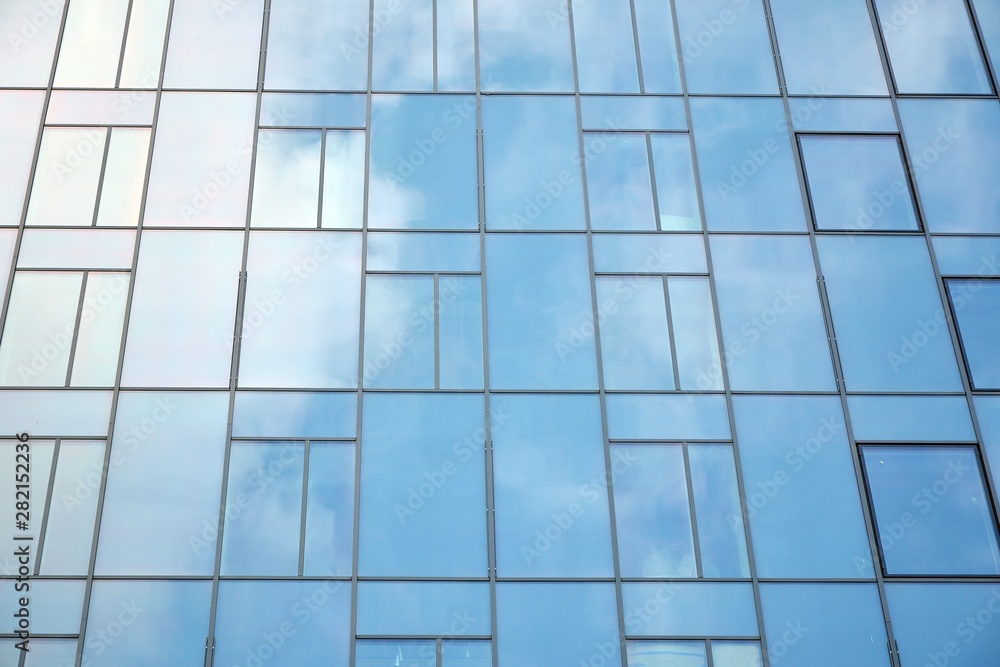 modern building with blue sky and clouds modern building with blue sky and clouds