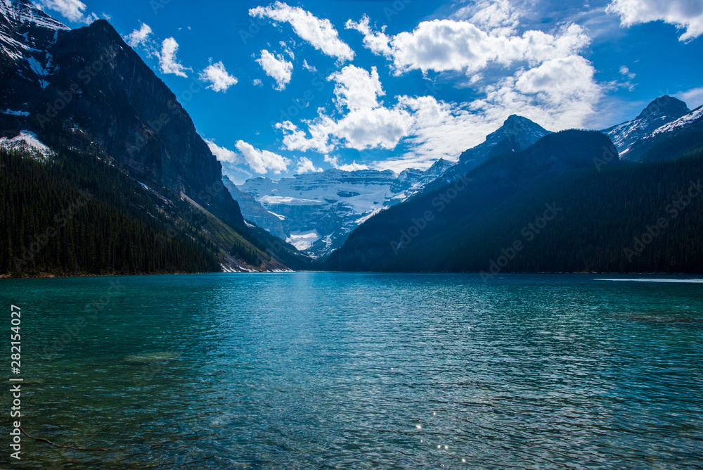 Colorful Lake Louise in Banff national park by a sunny summer