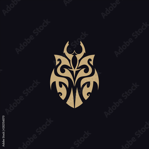 beetle with tribal tattoo logo vector design template