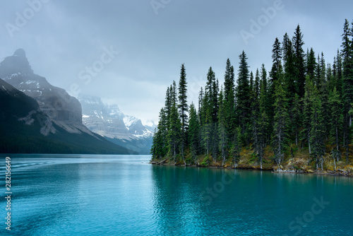 Typical colors of trees and water of canadian rockies lake