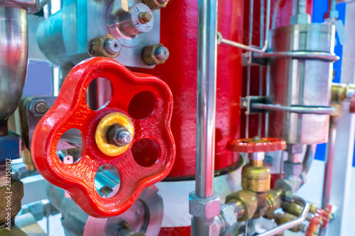 Red valve close-up. Fragmen...