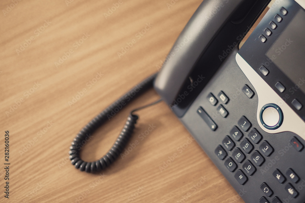 Close up soft focus on ip phone devices at office desk,Cocept business work. Close up soft focus on ip phone devices at office desk,Cocept business work.