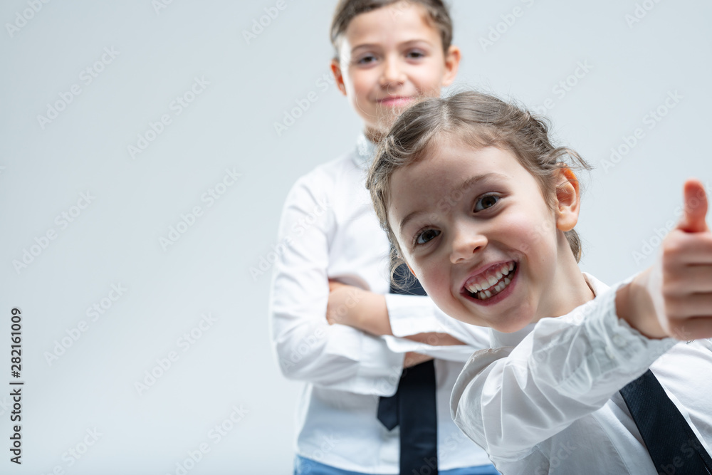 Cheeky enthusiastic little girl giving a thumbs up Cheeky enthusiastic little girl giving a thumbs up