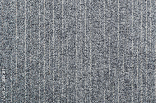 Light grey woolen fabric with pinstripes or chalk stripes background