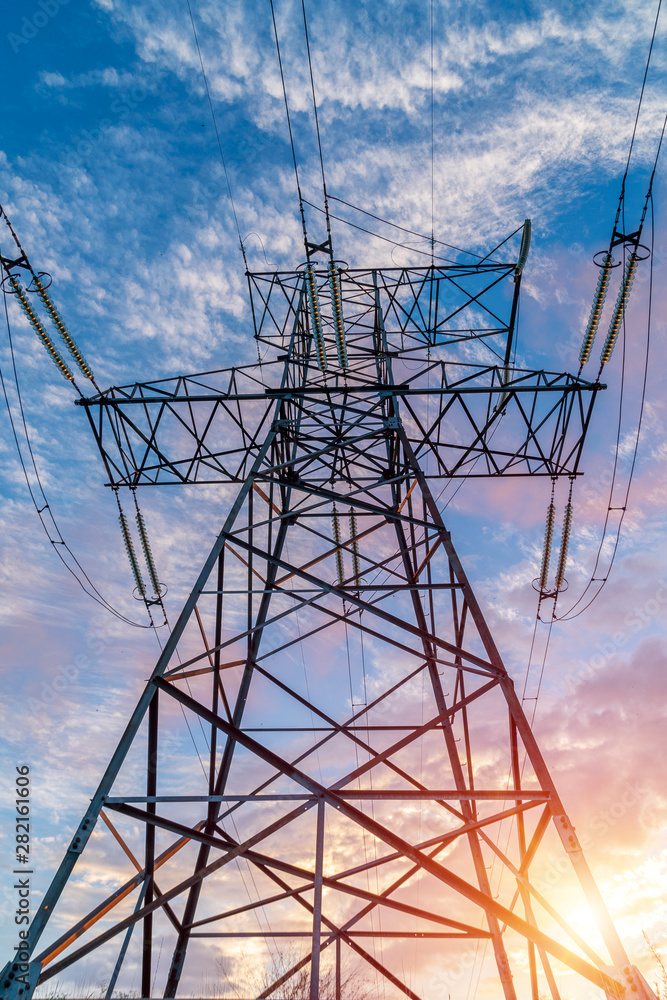 power transmission tower on background of blue sky