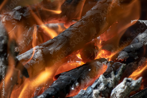Close up of flaming wood embers