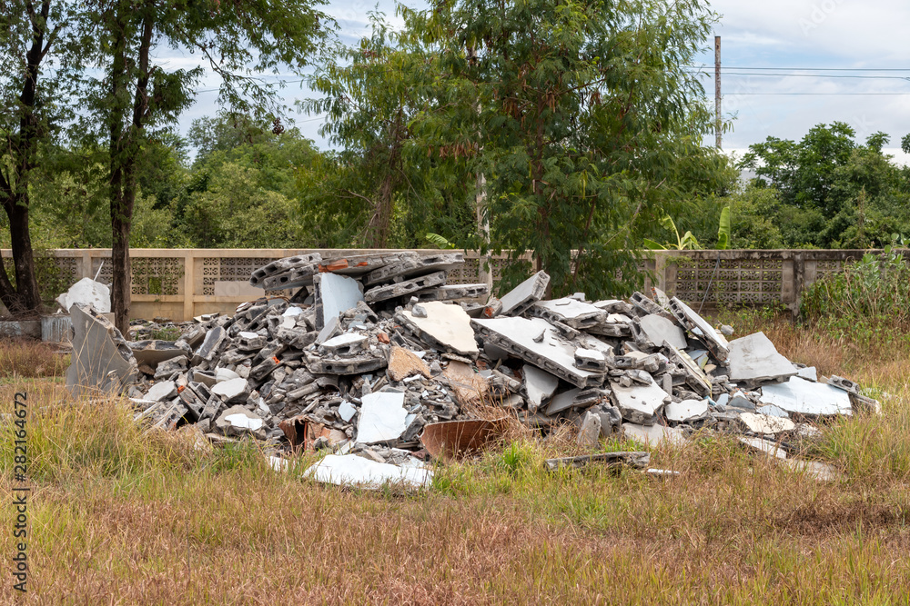 Debris debris, brick wall near concrete fence. Debris debris, brick wall near concrete fence.