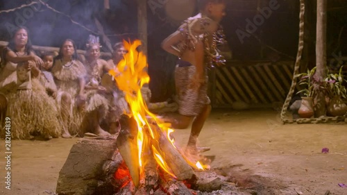 Aboriginal Culture And Art Show Indigenous Running Around Fire Traditional Event In Amazonian Jungle By Night In Ecuador