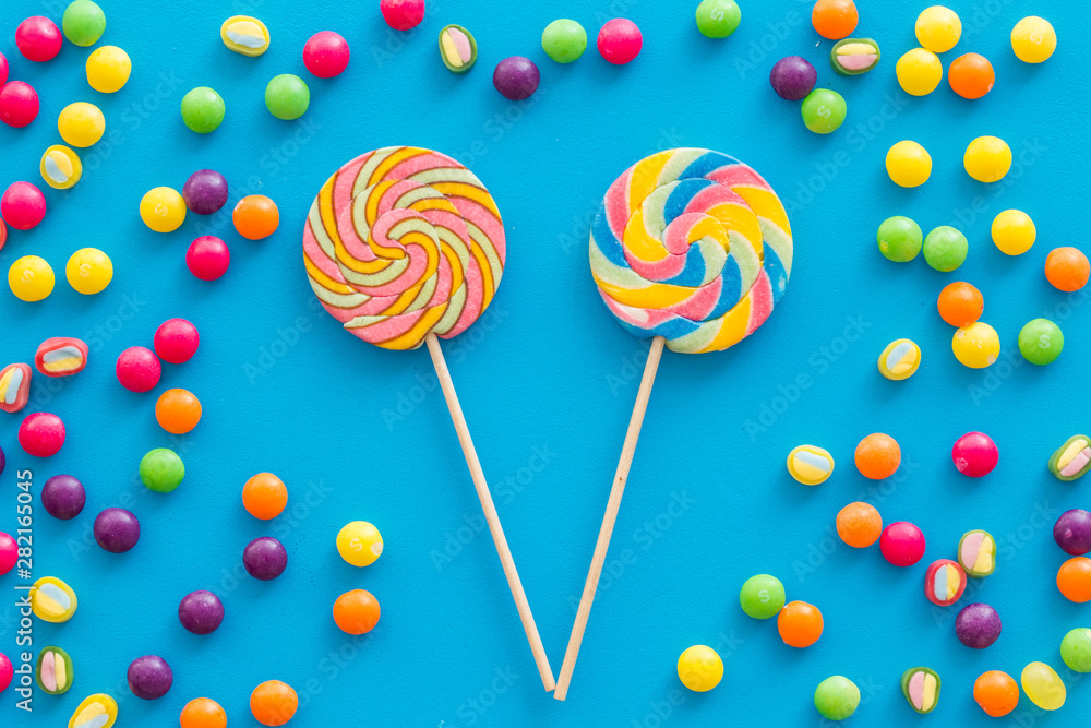 Sweets pattern on blue background top view Sweets pattern on blue background top view