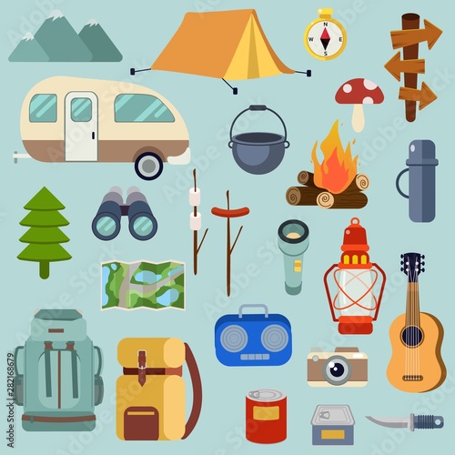 The collection of camping pack set for go to the forest picnic trip. trip of camping with the travel van. and tent in the forest. playing a music with redio and guitar. eat with a big pot. photo